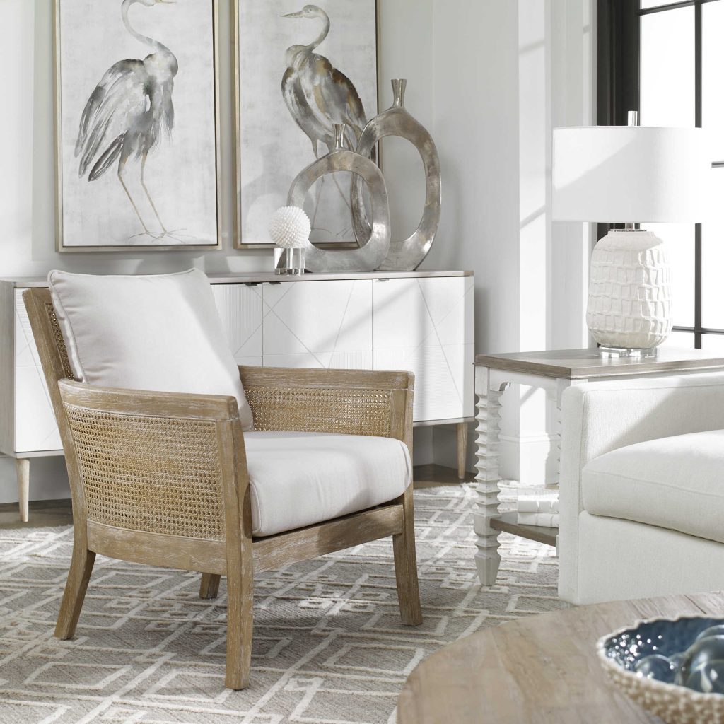 High supportive back and curvy flair arms make a grand style statement in a lightly glazed and bleached sandstone exposed hardwood finish with cane sides. REG $1647 NOW $825