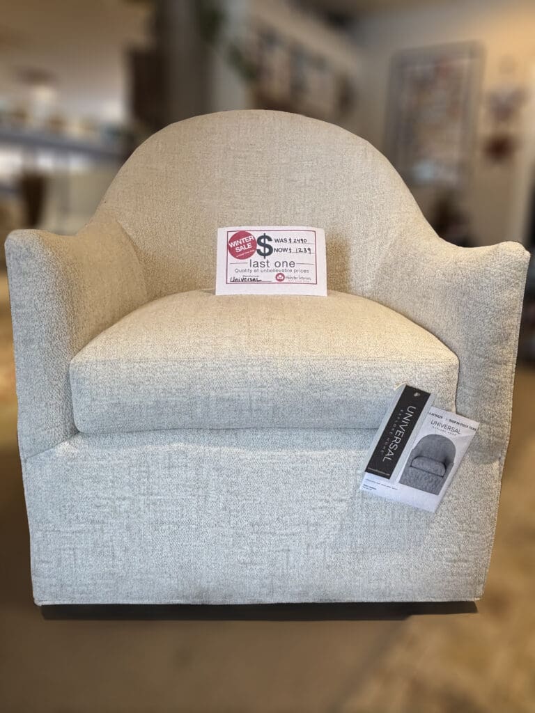 Universal fabric barrel swing chair. REG. $2,490 NOW $1,239