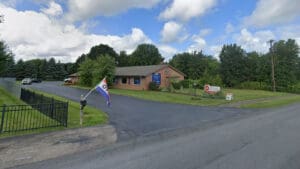Exterior of Webster Interiors showroom at 975 Ebner Drive, Rochester NY